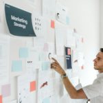 A casual business man checking a marketing plan